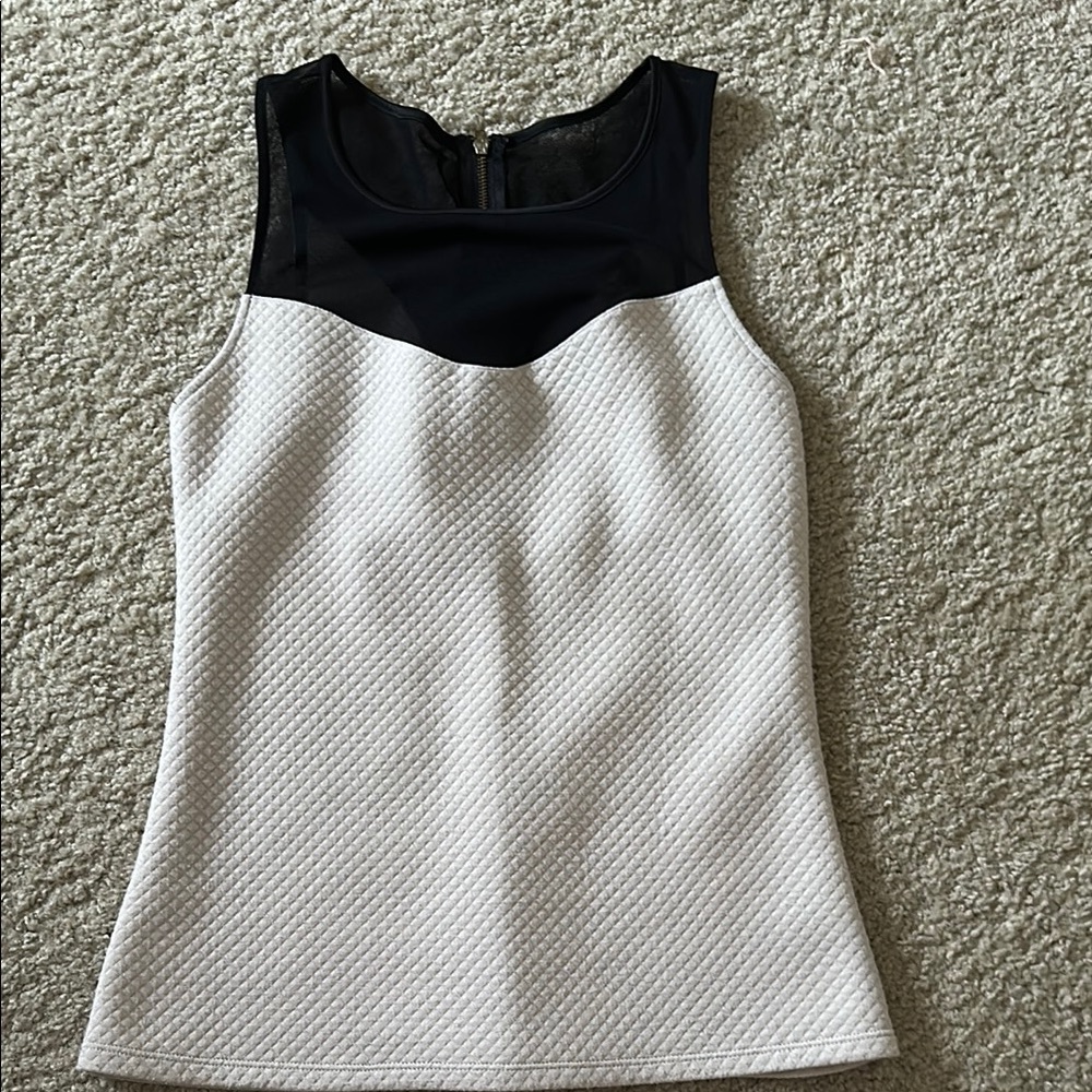 Elegant Black and White Sleeveless Top